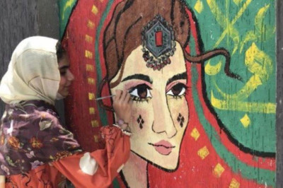 Students in Peshawar Paint Murals on Public Walls to Improve the City’s Image.